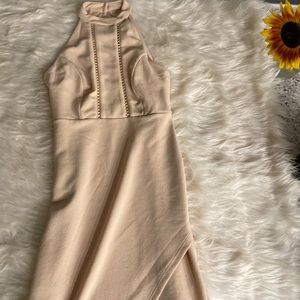 Nude dress with slitted leg